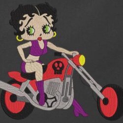 Motif de broderie machine de la célèbre betty boop sur sa moto